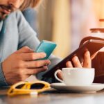 Man using technology in cafe